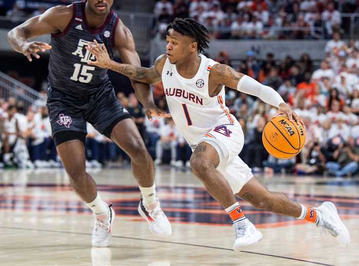 Auburn Tigers guard Wendell Green Jr. (1) drives the ball as Auburn Tigers men's basketball takes on Texas A&M Aggies at Auburn Arena in Auburn, Ala., on Saturday, Feb. 12, 2022. Auburn Tigers lead Texas A&M Aggies 33-18 at halftime.